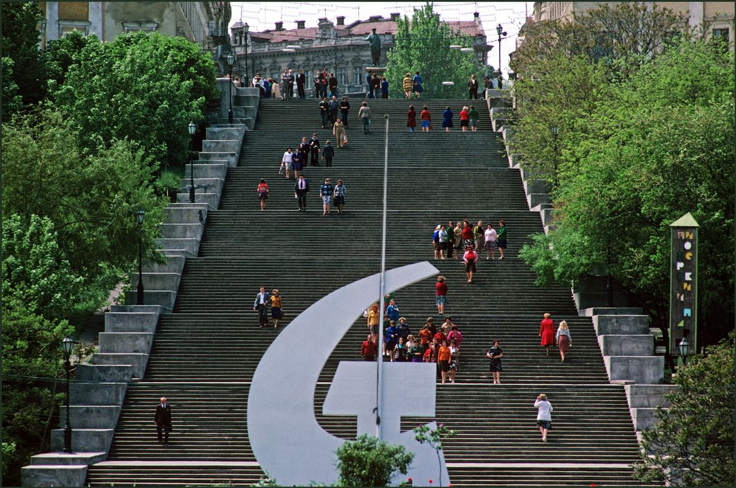 Ukraine.  Odessa.   The Boulevard Stairway or better known as the Potemkin Steps after the Battleship Potemkin, the crew of which went on strike against their officers in 1905. At the bottom a large Russian Hammer and Sickle.  1982